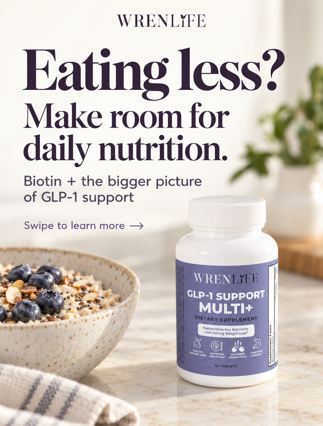 WrenLife Multi+ beside a bowl of oats and blueberries. Eating less? Make room for daily nutrition.